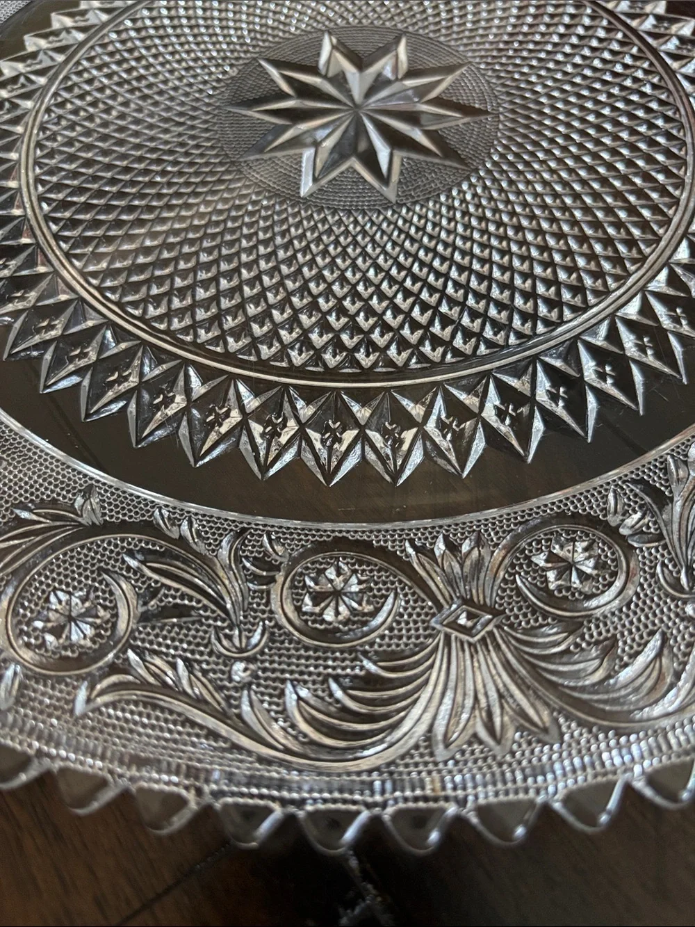 Vintage Pressed Glass Plate with Starburst and Ornate Floral Border